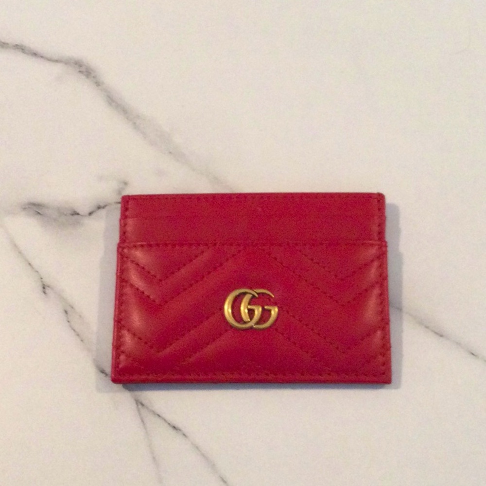 NWOT authentic Gucci red cardholder. Never used.